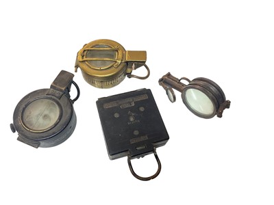 Lot 768 - Second World War British military MK III Prismatic compass by T. G. & Co Ltd, dated 1941, together with a Mark I Magnetic Marching compass and two other compasses (4).