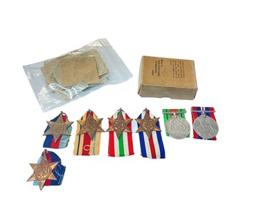 Lot 771 - Second World War medal group comprising 1939 - 1945 Star, Africa Star, Italy Star, France and Germany Star, Defence and War medals together with an additional 1939 - 1945 Star, box of issue and pap...