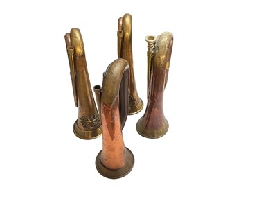 Lot 778 - First World War British military copper and brass bugle dated 1914, together with three other bugles (4)