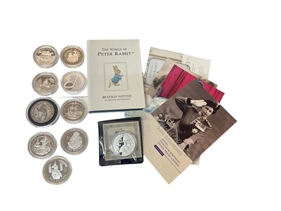 Lot 436 - World - Mixed silver rounds to include .925 silver x 9, .999 fine silver 2oz Lion of England 5 Pounds 2016 & Peter Rabbit colour enhanced 1oz sterling silver proof-like Ingot (11 items)