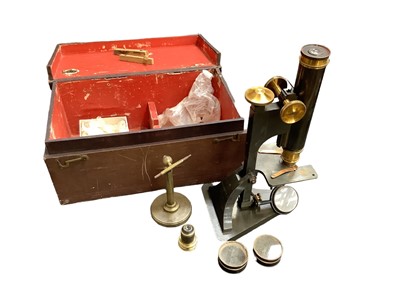 Lot 2555 - Microscope with brass fittings by R & J Beck Limited London, numbered 19719 in box.