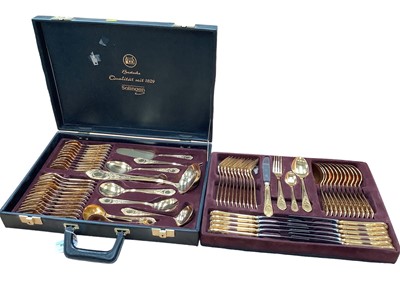 Lot 2556 - German canteen of gold plated cutlery with scroll decoration by Bestecke of Solingen.