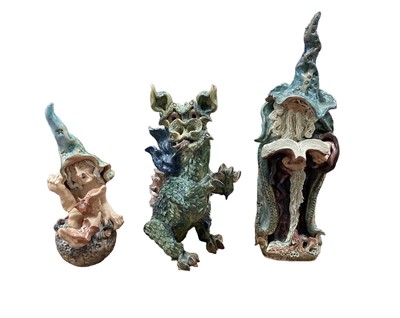 Lot 1248 - Group of three grotesque studio pottery models of wizards and dragons