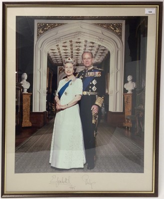 Lot 169 - H.M.Queen Elizabeth II and H.R.H.The Duke of Edinburgh, signed 1995 large presentation colour portrait photograph of the Royal couple wearing Orders and Decorations signed in ink 'Elizabeth R 1995...