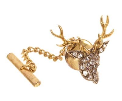 Lot 521 - Victorian gold and pavé set diamond pin in the form of a Stag's head