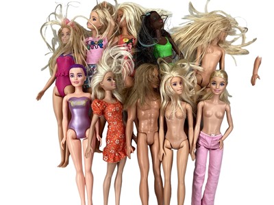 Lot 1976 - Large quantity of contemporary Barbie dolls and accessories including male dolls.