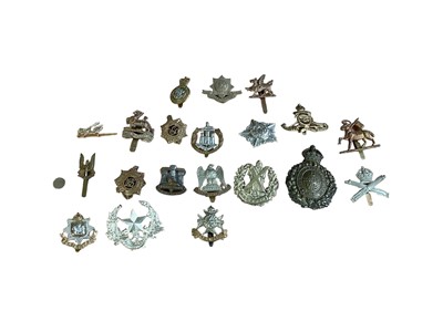 Lot 825 - Collection of British military cap badges to include King's Liverpool Regiment, Royal Scot Greys and Dorsetshire Regiment, approximately 20 badges.