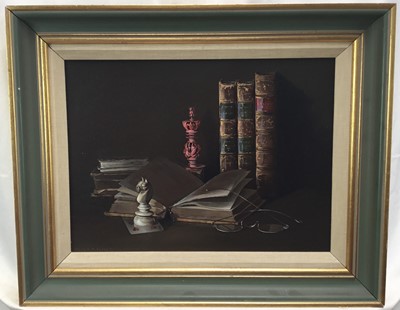 Lot 64 - Peter F. Fuller, oil on canvas - Still life of books, spectacles, chess pieces and a playing card, signed, 29cm x 39cm, signed