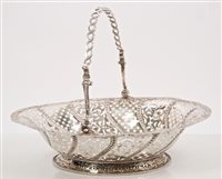 Lot 218 - George III Silverer cake basket of oval form,...