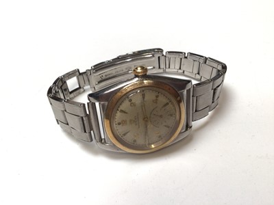 Lot 280 - 1950's Gentlemen's Rolex Oyster Perpetual chronometer wristwatch in stainless steel case with gold plated bezel, champagne dial, baton and Arabic numeral hour markers and subsidiary seconds dial, o...