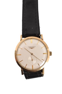 Lot 283 - 1960's Gentlemen's 9ct gold Longines wristwatch with silvered dial, baton hour markers and subsidiary seconds dial, with presentation inscription on rear of case, on leather strap, case approximate...