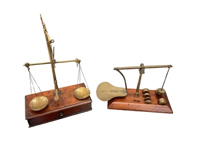 Lot 2535 - Set of antique Avery brass and mahogany beam scales with various weights inside, together with an unusual set of beam scales stamped 'Richardson Edinburgh' (2)