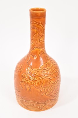 Lot 254 - Chinese yellow-glazed mallet vase, relief decorated with dragons chasing a flaming pearl, Qianlong mark to base