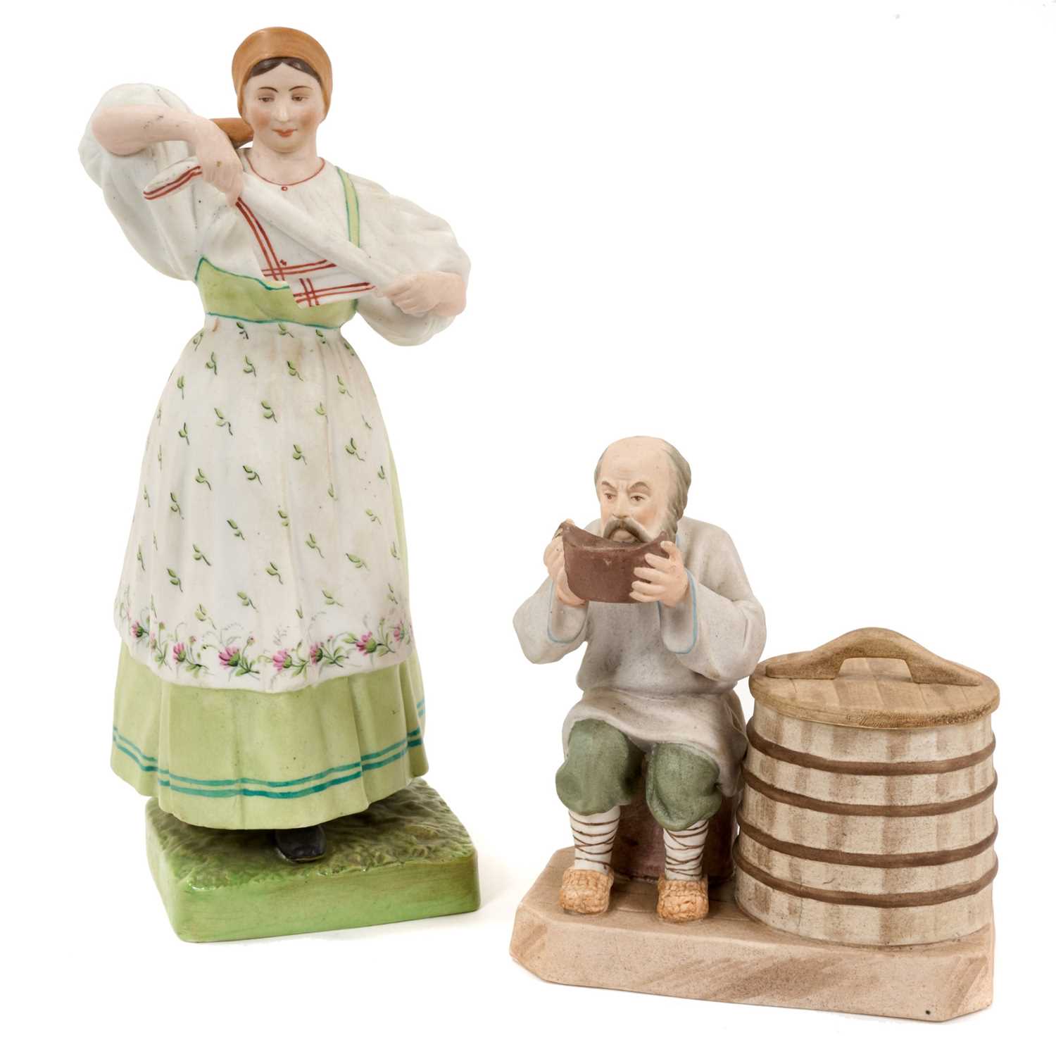 Lot 48 - Two Russian Gardner bisque porcelain folk figures