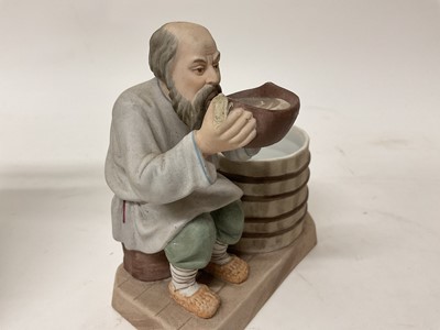 Lot 48 - Two Russian Gardner bisque porcelain folk figures
