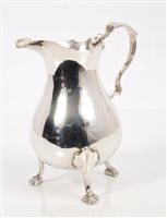 Lot 224 - George V Silverer cream jug of baluster form,...