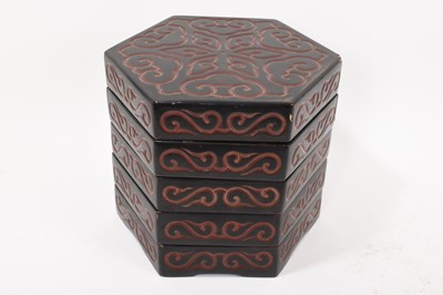 Lot 813 - Unusual Chinese Tixi lacquer set of five hexagonal stacking boxes, Xuande mark to base