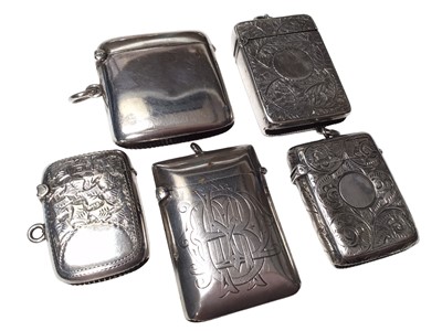 Lot 299 - Victorian silver vesta case with engraved decoration, (Birmingham 1893), together with four other silver vesta cases (various dates and makers), (5).