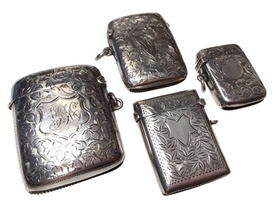 Lot 301 - Victorian silver vesta case with engraved decoration, (Birmingham 1904), together with three other silver vesta cases (various dates and makers), (4).