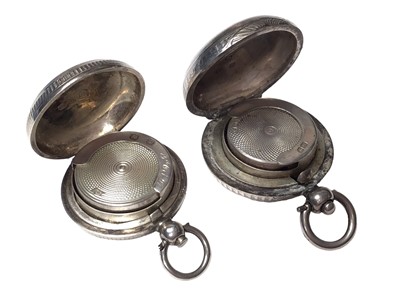 Lot 308 - Victorian silver sovereign case of circular form with engine turned decoration, (Birmingham 1896) and an Edwardian silver sovereign case of circular form, (Chester 1904), (2).