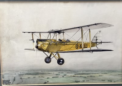 Lot 130 - Stanley Orton Bradshaw (1903-1950) watercolour- Bi-plane in flight, signed and dated 1935, 21cm x 31cm, in glazed frame