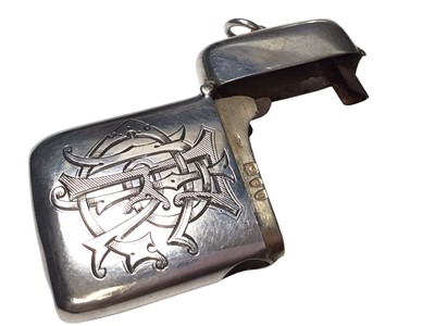 Lot 312 - Victorian silver combination vesta case and cigar cutter with engraved initials, (London 1895), maker William Richard Corke., 6.2cm in length.