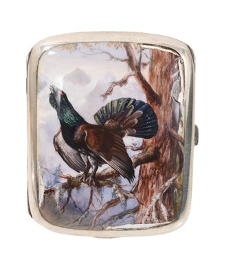 Lot 315 - Early 20th century Continental silver and enamel cigarette case of rectangular cushion cover, the front enamelled with a capercaillie in a Scottish woodland scene, marked 935, 9cm in length.