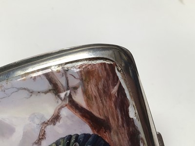 Lot 315 - Early 20th century Continental silver and enamel cigarette case of rectangular cushion cover, the front enamelled with a capercaillie in a Scottish woodland scene, marked 935, 9cm in length.