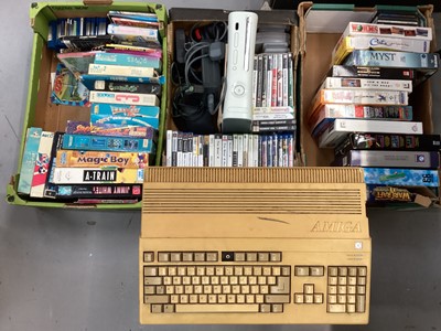 Lot 2030 - Three boxes of gaming related items to include Xbox 360 console, Amiga Commodore 500, Boxed Amiga games, PlayStation games, Pc CD Rom games and others