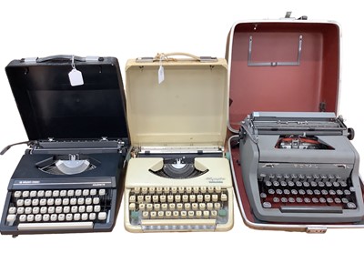 Lot 2628 - Typewriters Olympia, Silver - Reed and Royal, (3).