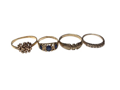 Lot 343 - Group of four gold rings to include a late Victorian 18ct gold sapphire and diamond ring (Birmingham 1900), and three other gold rings (4)