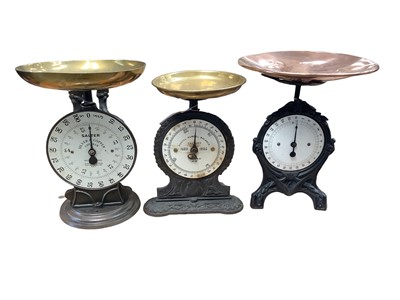 Lot 2564 - Three sets of Victorian and later scales, cast iron, brass and copper, with enamel dials, including Salter's Postal Parcel Balance, Salter Silver & Copper Checker, and one other (3)