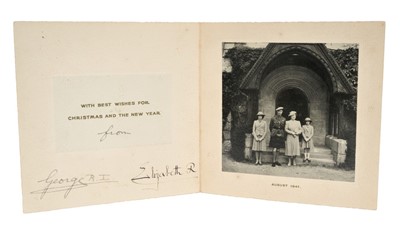 Lot 14 - T.M. King George VI and Queen Elizabeth, scarce wartime 1941 Christmas card with gilt embossed crown to cover, black and white photograph of the King and Queen with their two daughters outside a ch...