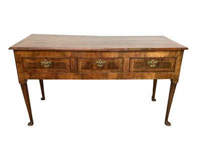 Lot 1276 - George I and later walnut dresser base