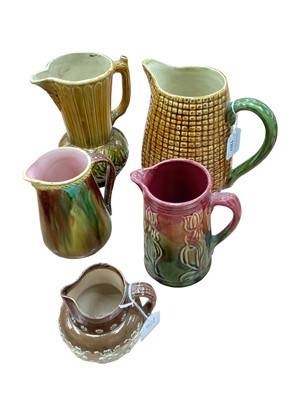 Lot 401 - Group of Majolica jugs together with a Doulton Lambeth stoneware jug