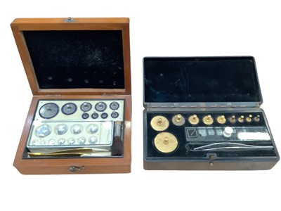 Lot 2581 - Two cased sets of jewellers weights