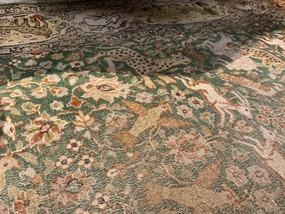 Lot 1547 - Part silk Kashan rug