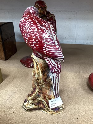Lot 1509 - Chinese sang de boeuf standing figure, a similar parrot figure and a similar vase
