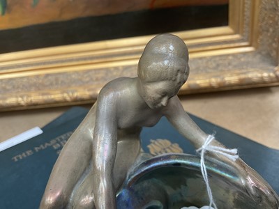 Lot 1507 - Early 20th century Zsolnay iridescent figure of Anonymous, and another. girl with shell