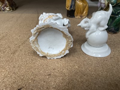 Lot 1510 - Two small Berlin porcelain figures other white glazed and similar porcelain figures