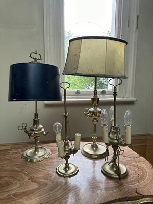 Lot 1514 - Continental bronze table lamp, in the form of a Classical style oil lamp, four others similar