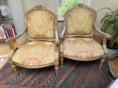 Lot 1534 - Of Papal interest: Fine pair of 18th century Italian silk upholstered carved giltwood open armchairs