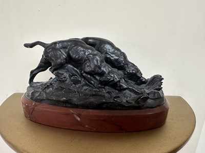Lot 1524 - After Barye bronze group of two hunting dogs, raised on rouge marble plinth