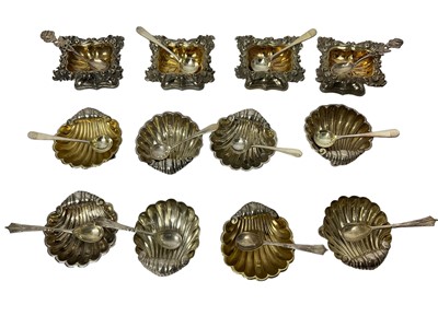 Lot 1628 - Set of eight Edwardian shell shaped salts, others