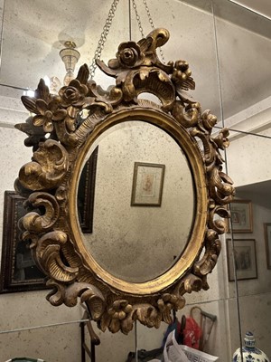 Lot 1565 - Pair of 18th century Italian gilt wall mirrors
