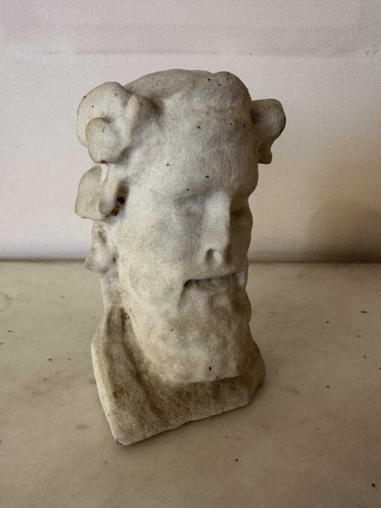 Lot 1585 - Classical carved marble head of Dionysus