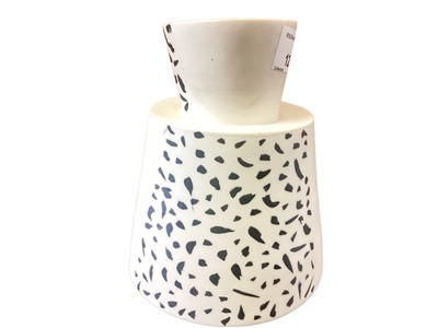 Lot 1280 - Felicity Aylieff (b.1954) asymmetric vase with speckled black decoration on white ground, signed to base