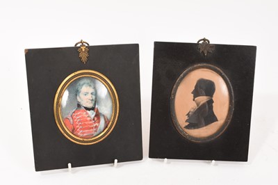 Lot 747 - English School, early 19th century, portrait miniature on ivory, an officer, together with a portrait silhouette