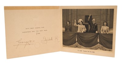 Lot 17 - T.M.King George VI and Queen Elizabeth, scarce signed wartime 1945 Christmas card with gilt embossed crown to cover, black and white photograph of the Royal Family on the balcony of Buckingham Pala...