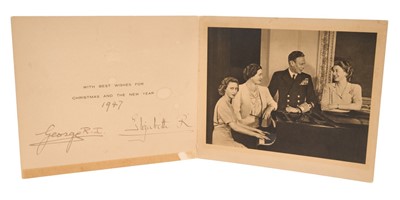 Lot 18 - T.M.King George VI and Queen Elizabeth, scarce signed 1947 Christmas card with gilt embossed crown to cover, black and white photograph of the smiling Royal Family by a grand piano with Princess Ma...